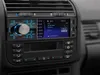 A car radio with a screen and buttons, installed in a car dashboard. Produktbild-Vorschau