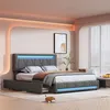 A modern bedroom with a grey upholstered bed featuring LED lighting. Náhľad obrázku produktu