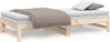 A wooden daybed with mattresses and bedding, shown from a diagonal angle against a white background. Produktbild-Vorschau