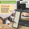 A cat is scratching a ramp on a cat tree, with another cat sleeping in a hammock. Produktbild-Vorschau
