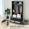 A black entryway hall tree with a bench and storage, decorated with plants and accessories. Podgląd zdjęcia produktu