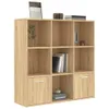 A wooden bookshelf with multiple compartments, some containing books and decorative items. Náhled obrázku produktu
