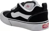 A side view of a black and white Vans sneaker. Voir les images du produit
