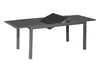 A gray outdoor dining table with a glass top, shown with an extension leaf partially pulled out. Náhled obrázku produktu
