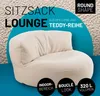 A beige beanbag chair with text overlays describing its features. Podgląd zdjęcia produktu