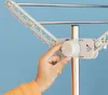 A hand is shown adjusting a knob on a drying rack. Náhled obrázku produktu