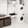 A laundry room with a sink, washing machine, dryer, and storage baskets. Produktbild-Vorschau
