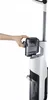 A hand is shown detaching a component from a white and gray vacuum cleaner. Náhľad obrázku produktu