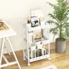 A white rolling cart filled with books, art supplies, and decorative items, placed next to a white desk and a potted plant. Anteprima dell’immagine prodotto