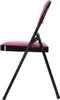 A side view of a pink folding chair with black metal legs. Produktbild-Vorschau