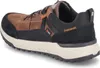 Side view of a brown and black sneaker. Voir les images du produit