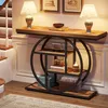 A console table with decorative items and lamps in a home setting. Voir les images du produit