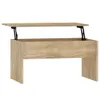 A light brown wooden coffee table with a lift-top mechanism, shown against a white background. Náhled obrázku produktu