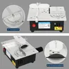 A collage of two images showing a mini table saw from different angles, with close-up insets highlighting features. Produktbild-Vorschau