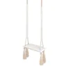 A product shot of a beige and white swing with tassels, isolated on a white background. Náhľad obrázku produktu