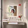 A bathroom vanity with a lighted mirror above a sink. Náhľad obrázku produktu