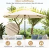 An outdoor patio umbrella is shown in a garden setting with furniture and trees. Náhled obrázku produktu