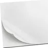 A white surface with a corner peeling back, revealing a black edge underneath. Produktbild-Vorschau