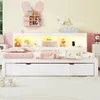 A child's bedroom with a white bed, shelves with toys, and decorative elements. Podgląd zdjęcia produktu