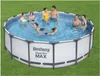 People are enjoying themselves in an above-ground swimming pool on a sunny day. Produktbild-Vorschau