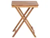 A wooden folding table with an X-shaped base, shown from the side against a white background. Náhled obrázku produktu