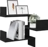 A black wooden shelf unit with decorative items. Náhled obrázku produktu