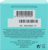 The back of a Tiffany & Co. perfume box showing ingredients, distribution information, and barcodes. Náhled obrázku produktu