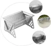 Collage of images showing a portable folding grill from different angles and in different settings. Anteprima dell’immagine prodotto