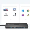 A Ugreen USB hub is shown in the foreground, with marketing graphics of compatible devices and operating systems in the background. Produktbild-Vorschau
