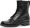 A studio shot of a black leather boot. Produktbild-Vorschau