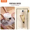 A collage showing a portable dryer being placed into a suitcase and another dryer with a shirt inside, with dimensions indicated. Voir les images du produit