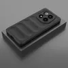 A black phone case with a textured back and a camera bump is displayed on a gray pedestal. Produktbild-Vorschau