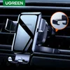 A car phone holder attached to an air vent. Náhled obrázku produktu