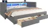 A modern upholstered bed with integrated storage, shelving, and LED lighting. Podgląd zdjęcia produktu