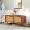 A shoe bench with rattan doors and a coat rack in a hallway. Anteprima dell’immagine prodotto