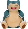 A plush toy of the Pokemon Snorlax is sitting and facing the camera. Produktbild-Vorschau