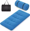 A blue sleeping mat, a rolled-up blue sleeping mat, and a black carrying bag are displayed against a white background. Produktbild-Vorschau