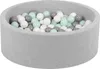 A light gray ball pit filled with white, gray, and mint green balls. Anteprima dell’immagine prodotto