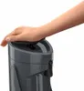 A hand pressing down on the lid of a gray pitcher. Anteprima dell’immagine prodotto