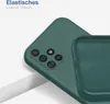 A close-up view of a green phone case, showing the camera cutout and the interior texture. Produktbild-Vorschau