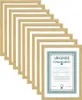 A stack of ten natural wood picture frames, with one frame in the foreground displaying a certificate with the word 'URKUNDE' at the top. Produktbild-Vorschau