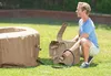 A man is setting up an inflatable hot tub outdoors. Náhľad obrázku produktu