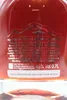 A close-up of a whiskey bottle label with product information and branding. Produktbild-Vorschau