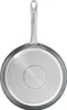 The underside of a frying pan with its handle. Podgląd zdjęcia produktu