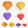 A diagram showing four different sizes of heart-shaped stepping stones with dimensions labeled. Below the diagram are four individual stepping stones in different colors. Náhľad obrázku produktu