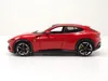 A red Ferrari Purosangue model car is shown from the side against a white background. Anteprima dell’immagine prodotto