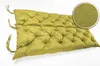 A tufted green bench cushion on a white background. Produktbild-Vorschau