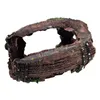A decorative aquarium ornament resembling a hollowed-out log or barrel. Produktbild-Vorschau