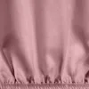 A close-up view of a pink fabric with gathered elastic. Náhľad obrázku produktu