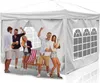 People are having a party outside a white tent. Náhled obrázku produktu